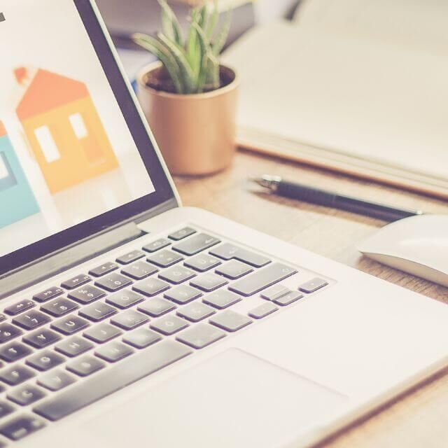 real estate graphic on laptop